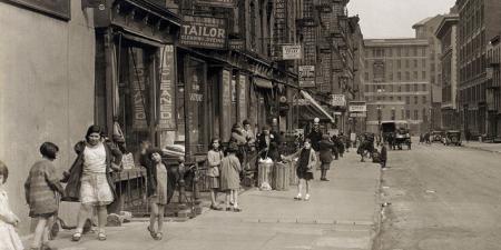 Depression era street life with children playing and dancing in the street. Lots of vintage storefronts and two 1920 cars parked. 28th street looking east from Second Avenue. New York. April 1931. | Flickr - Photo Sharing!